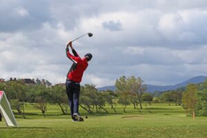 Golfer playing in Llandudno 