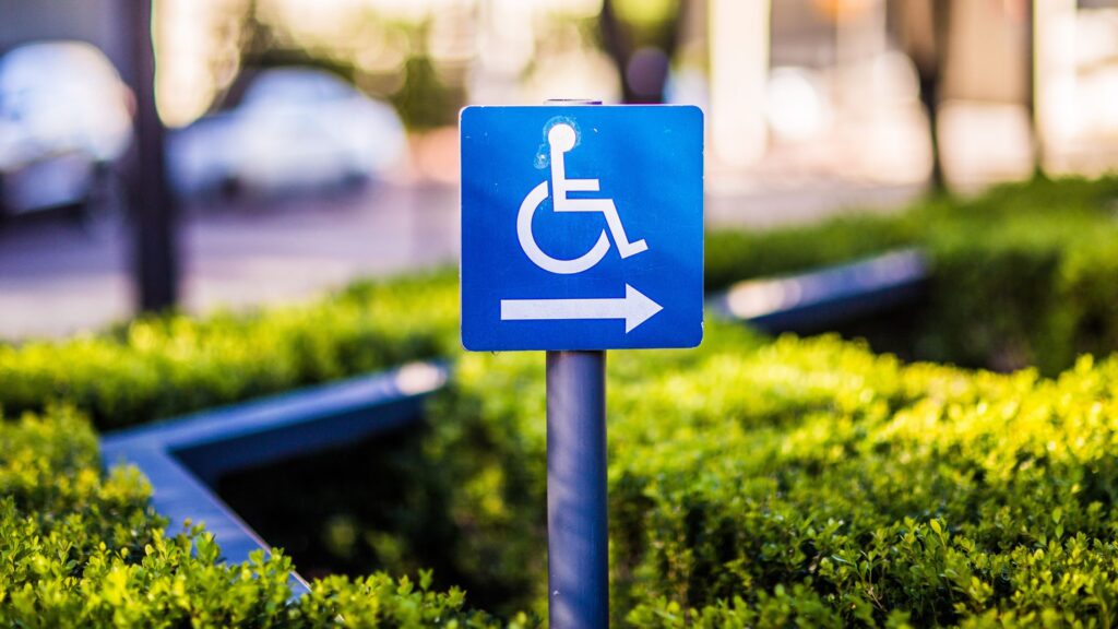 Shallow Focus Photo of PWD Signage